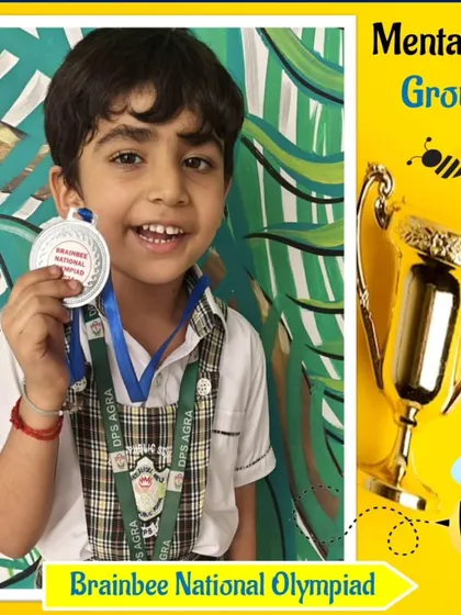 A happy winner from the Mental Math (Group A) competition at DPS Agra, showing off his 2024 silver medal.