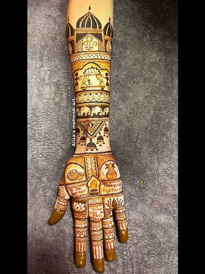 The full view of the story-based mehendi, showing how different elements come together to create a cohesive narrative across both arms.
