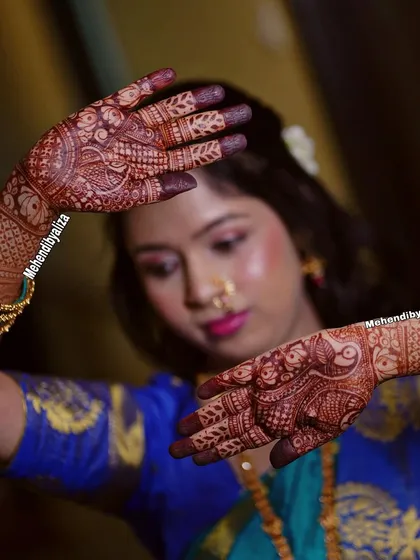 A beautiful pose showcasing the dark and lovely henna stain.