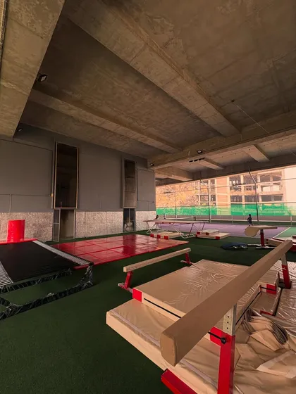 Another angle of my gymnastics training area, showcasing the balance beams and tumbling mats. It's a space built for fostering talent, discipline, and a love for the sport.