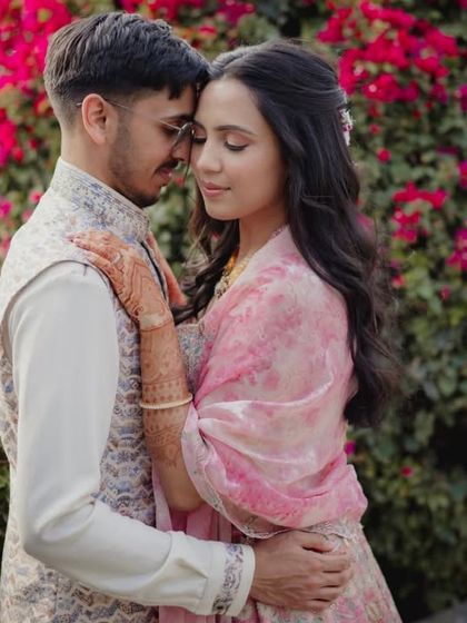 A romantic, intimate portrait of the couple, finding a quiet moment together during their Mehendi celebration.