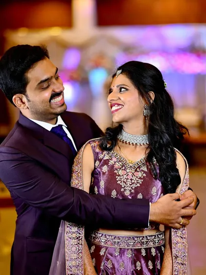 Capturing the unscripted smiles between a couple is what I love most. This candid moment from a wedding reception shows the pure happiness and connection that makes for a timeless memory.