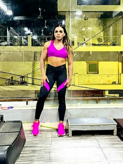 Bright colors and a strong pose. Your fitness journey should be fun and full of energy. The right diet is key to having the stamina to train hard and live fully.