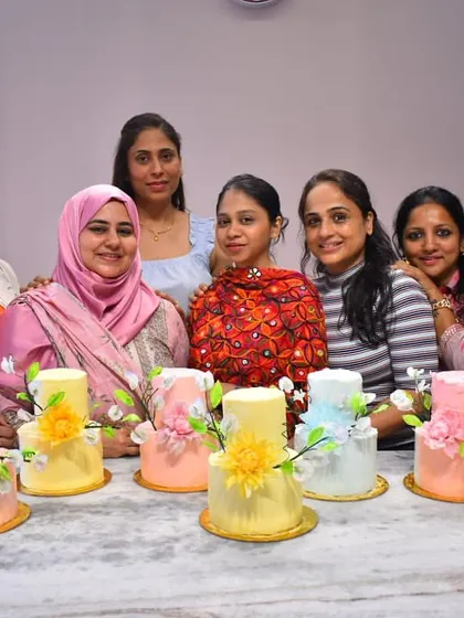Nothing makes me happier than seeing my students proudly show off their beautiful creations. This is from the finale of our celebration cake masterclass, where everyone designed and finished their own unique cake.