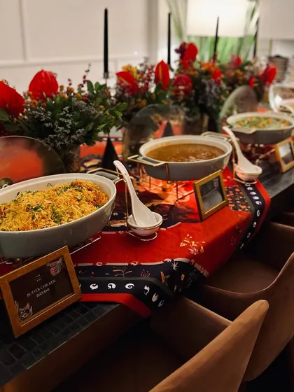 A buffet-style meal from one of our home catering experiences, showing a variety of dishes ready to be served.