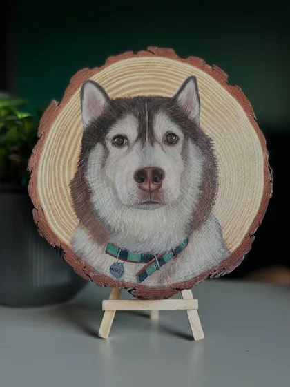 This handsome Husky was painted on a wood slice, with the natural wood grain showing through. It gives the portrait a rustic, earthy feel that I love.
