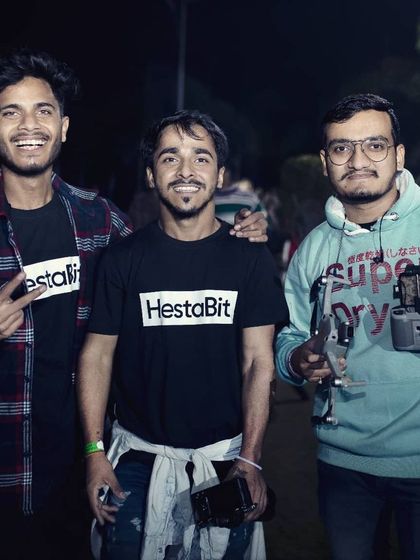 Me and my team members holding our camera and gimbal setups. We use professional stabilization gear to create smooth, cinematic video footage.