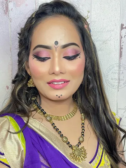 Another view of the festive Garba makeup, showing how the look is both beautiful with eyes open and closed.