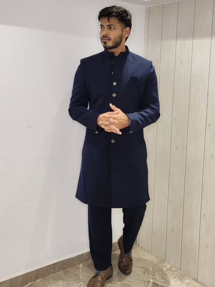 The Navy Blue Nawabi kurta, styled with formal shoes for a complete, polished look.