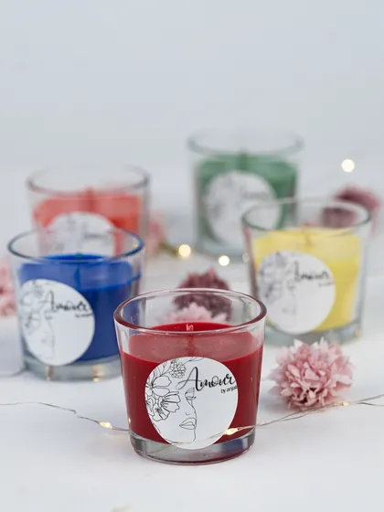 Our simple shot glass candles are a great canvas for customization. Available in various colors, they can be branded with custom labels for any event or business.