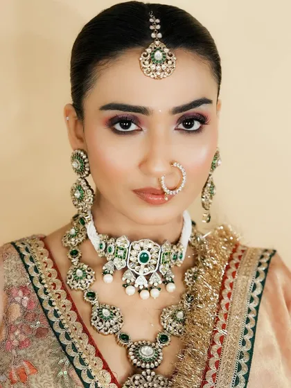 This is a perfect example of a classic North Indian bridal look. You will learn the nuances of creating makeup that complements heavy kundan and polki jewelry.