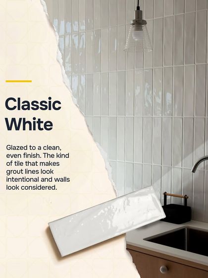 The classic white subway tile offers a clean, even finish. It's the kind of tile that makes grout lines look intentional and walls look considered, perfect for a timeless kitchen or bathroom backsplash.