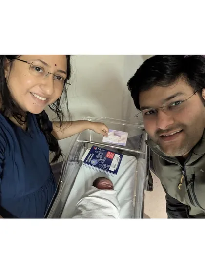 Kalyani and her husband in Sydney with their newborn. Their story shows how our classes prepare couples to work as a team, even when they are sent home from the hospital to labor for a while.