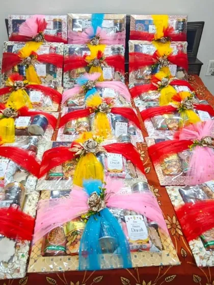 The wedding sagan hampers laid out, showing the variety of colors and consistent quality of wrapping.