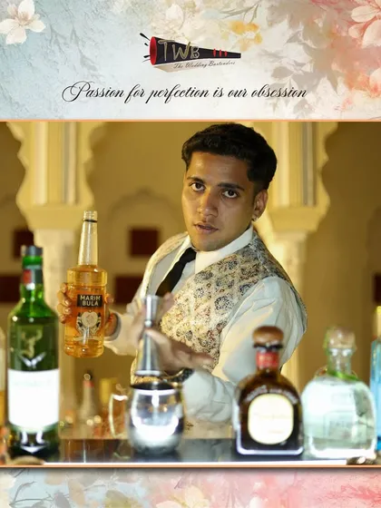 Our mixologist presents a selection of premium spirits, ready to craft a bespoke cocktail for a guest at a welcome dinner in Ranthambore.