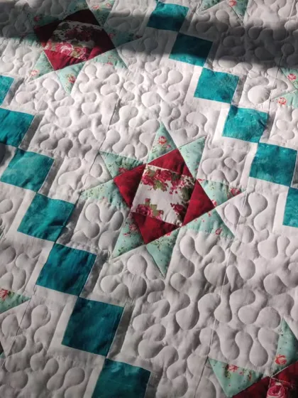 A close-up of the star blocks, highlighting the fabric choices.