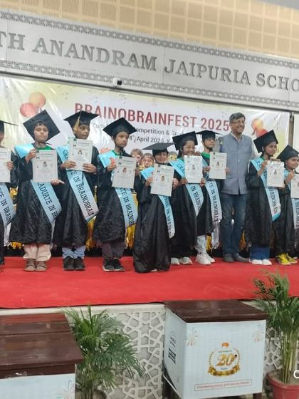 A group of our graduates on stage in their caps and gowns. This moment symbolizes their hard work, determination, and the bright future that lies ahead of them.