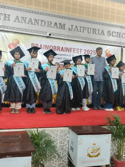 A group of our graduates on stage in their caps and gowns. This moment symbolizes their hard work, determination, and the bright future that lies ahead of them.
