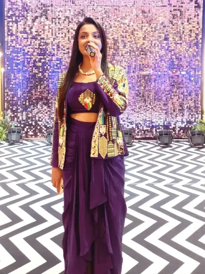 On stage for Harsh and Rutu's Sangeet. It was an honor to be invited back by the family for another milestone, and I managed everything from the DJ to the couple's entry.