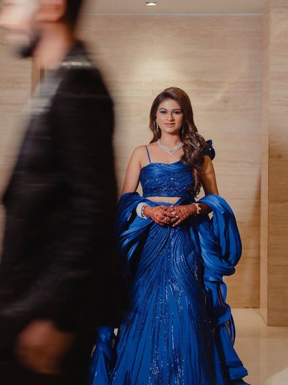 An artistic shot with motion blur, highlighting the bride's stunning look as the focal point.
