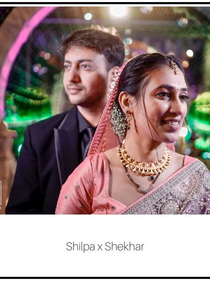 A candid shot of Shilpa and Shekhar during their reception. I love capturing these unposed moments where the couple is simply enjoying the celebration and each other's company.