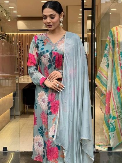 I love the bold floral print on this grey kurta pant set. It's a modern, stylish piece that's sure to make a statement.