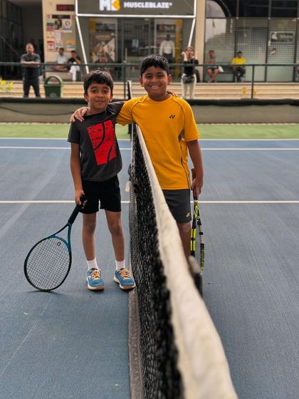 Brothers and training partners at the academy. Tennis is a great activity for siblings to learn and grow together in a healthy, active environment.