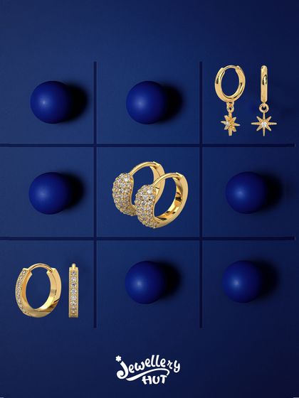 Three in a row, all in a glow. This tic-tac-toe of our favorite hoops shows the variety we offer, from classic sparkle to celestial star charms.