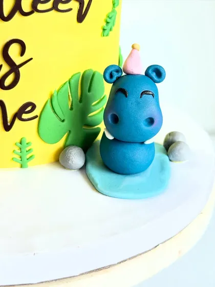 Another angle of the cute hippo topper. It's all about bringing joy through these little edible creations.
