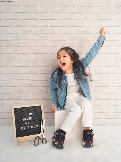 Celebrating a first haircut with lots of personality! Using a letter board is a great way to commemorate unique milestones like this.