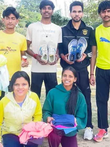 A group of young, talented athletes after receiving their new running kits. Seeing them equipped and ready to train is a huge victory for us.