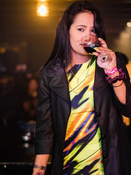 A guest enjoying a glass of wine.