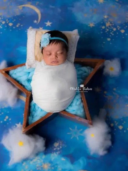 Sweet dreams are made of this. A sleeping newborn in a star prop is one of the most requested shots, and it's easy to see why.