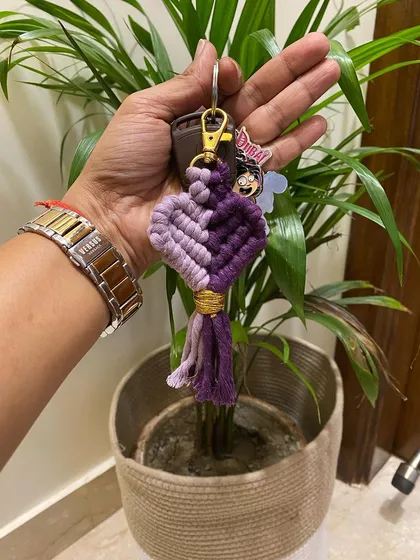 Another color combination for the macrame heart keychain, this time in two shades of purple. I can create these in any custom colors you like.