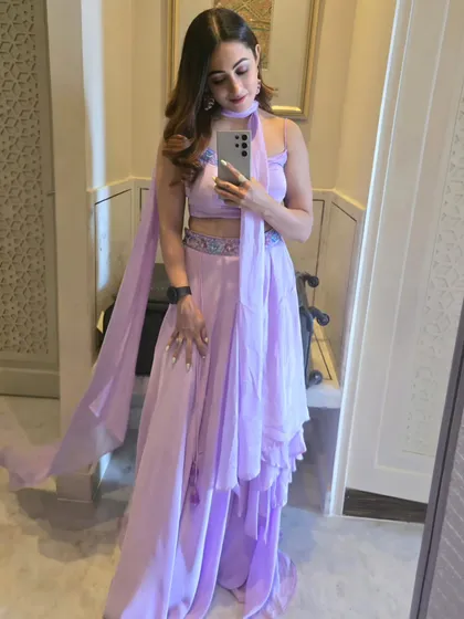 A beautiful lavender outfit for a lavender-themed event. I love coordinating my look with the event's decor to create a cohesive and visually stunning experience.