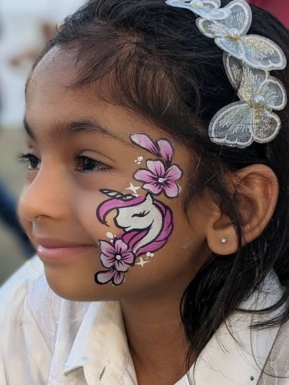 A beautiful unicorn design nestled among purple flowers, a truly magical combination for any unicorn lover.