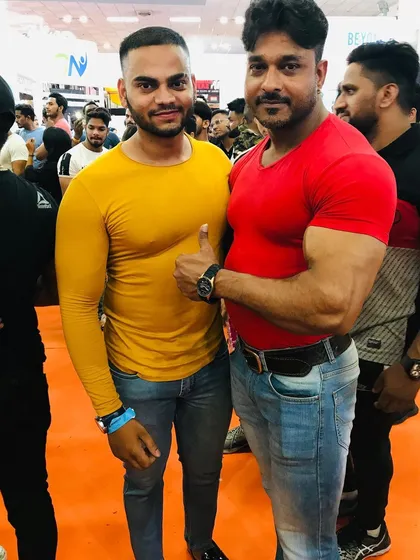 With my Guru Bhai, Arun. Learning from bodybuilding champions like him is an honor and helps me bring more knowledge to my clients.