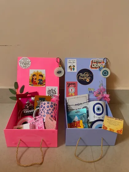 Fun and vibrant Raksha Bandhan hampers for brothers and sisters. I designed these with a trendy evil eye theme to celebrate the special bond between siblings with style and good vibes.