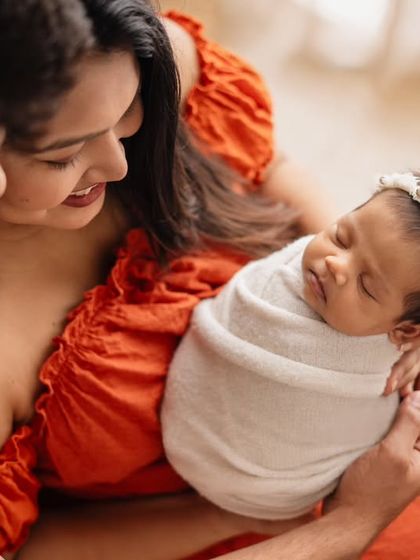 A classic family portrait with your newborn wrapped snugly in your arms. I love the way this image focuses on the three of you, creating a memory of your first days as a new family.