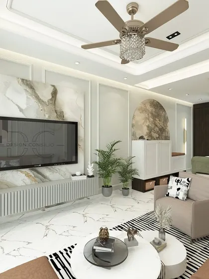 We designed this living room with a focus on clean lines and a sophisticated feel. The marble-clad TV wall adds a touch of luxury, while the fluted paneling on the console provides texture and a modern look.