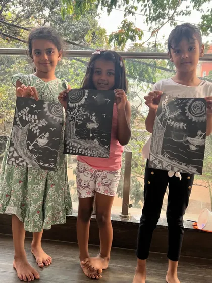 Who says you need color to make a masterpiece? Our little artists explored the striking contrast of chalk on black canvas to create these beautiful nature scenes. It's amazing to see them learn new techniques and produce such stunning results.