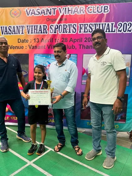 Girls U-13 runner-up Yahvi Vaidya with her award.
