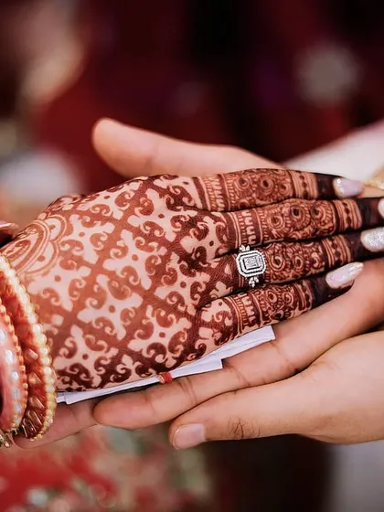 The final result is what matters most. This photo captures the beautiful, deep red stain of my natural henna, a sign of high-quality paste and proper aftercare. This rich color is the perfect finishing touch for your wedding look.