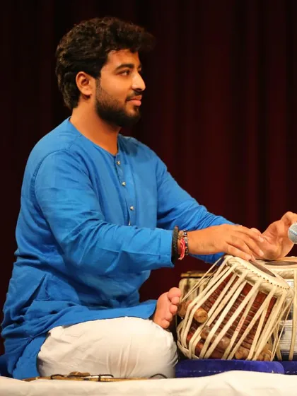 A side profile during my tabla performance at the Debadhara Festival.