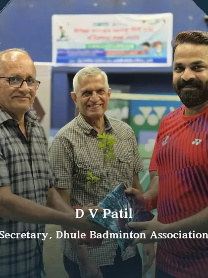 D V Patil, Secretary of the Dhule Badminton Association, is honored at our event. My tournaments serve as a platform for collaboration between officials from different districts.