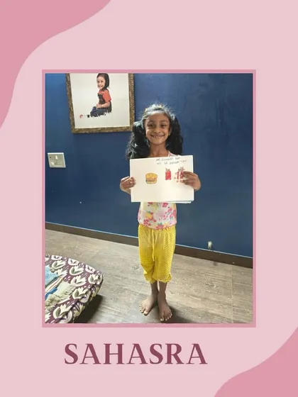 Here is Sahasra, proudly showing off her food illustration. We believe art is a powerful medium for expression, not just for learning technical skills.