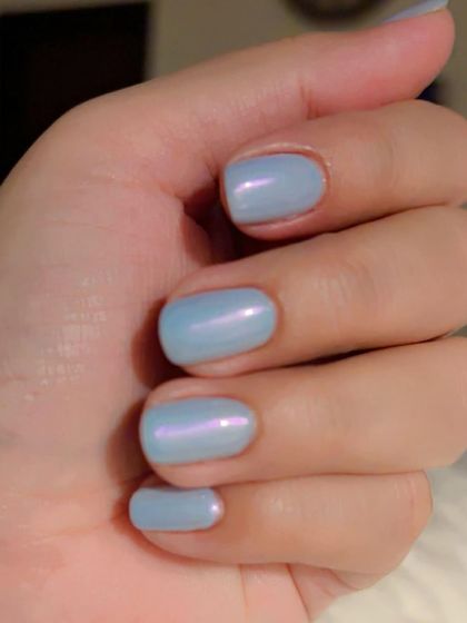 Baby blue holochrome nails, perfect for adding a pop of pastel color with a trendy finish.