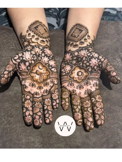 A full view of a Karwachauth design with a crescent moon motif, surrounded by a dense floral pattern.