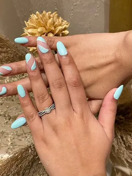 Flaunt your nails. This is the same minty blue abstract design, showing how great it looks from every angle.