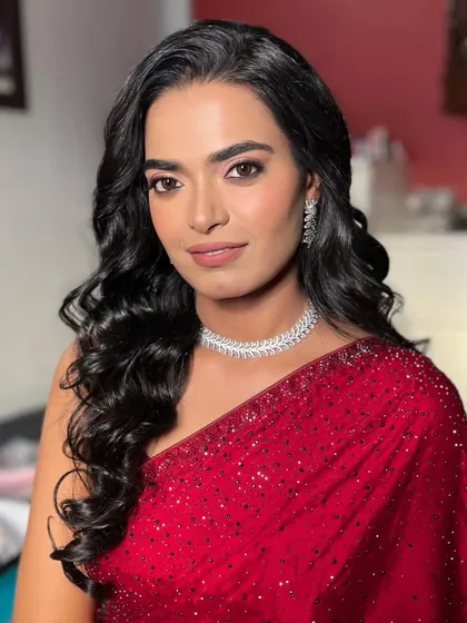 The complete look, exuding elegance and confidence. This is a perfect style for a reception or formal event.